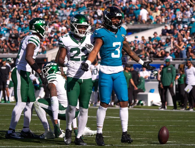 Jacksonville Jaguars wide receiver Jakobi Meyers (3) celebrates a pass interception in the first quarter during an NFL football game at EverBank Stadium, Sunday, Dec. 14, 2025, in Jacksonville, Fla. [Doug Engle/Florida Times-Union]