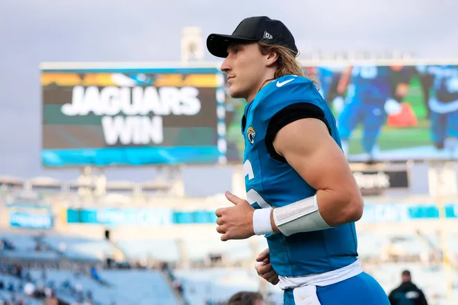 Jacksonville Jaguars quarterback Trevor Lawrence (16) runs off the field after the game of an NFL football matchup at EverBank Stadium, Sunday, Dec. 14, 2025, in Jacksonville, Fla. The Jaguars defeated the Jets 48-20. [Corey Perrine/Florida Times-Union]