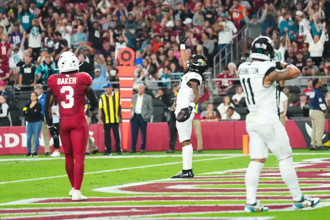 Nov 23, 2025; Glendale, Arizona, USA; Jacksonville Jaguars wide receiver Jakobi Meyers (3) celebrates after scoring a touchdown during the third quarter against the Arizona Cardinals at State Farm Stadium. Mandatory Credit: Joe Camporeale-Imagn Images