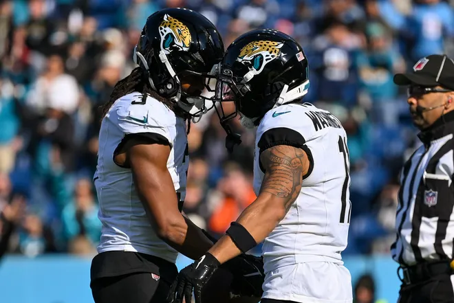 Nov 30, 2025; Nashville, Tennessee, USA; Jacksonville Jaguars wide receiver Jakobi Meyers (3) celebrates with his teammates after touchdown against the Tennessee Titans during the first half at Nissan Stadium. Mandatory Credit: Steve Roberts-Imagn Images