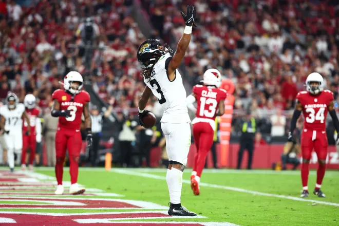 Nov 23, 2025; Glendale, Arizona, USA; Jacksonville Jaguars wide receiver Jakobi Meyers (3) celebrates after scoring a touchdown during the third quarter against the Arizona Cardinals at State Farm Stadium. Mandatory Credit: Mark J. Rebilas-Imagn Images
