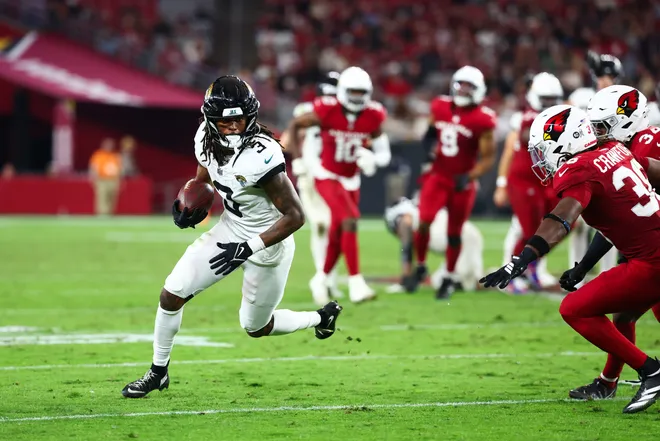 Nov 23, 2025; Glendale, Arizona, USA; Jacksonville Jaguars wide receiver Jakobi Meyers (3) runs after making a catch during the fourth quarter against the Arizona Cardinals at State Farm Stadium. Mandatory Credit: Mark J. Rebilas-Imagn Images