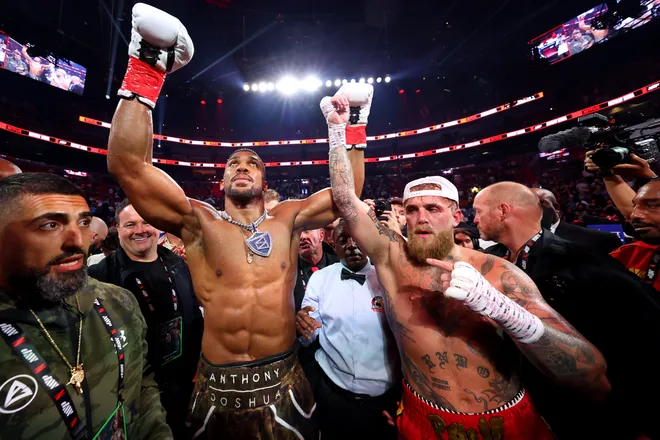MIAMI, FLORIDA - DECEMBER 19: Anthony Joshua celebrates victory over Jake Paul after their heavyweight bout during Jake Paul v Anthony Joshua at Kaseya Center on December 19, 2025 in Miami, Florida. (Photo by Ed Mulholland/Getty Images for Netflix)
