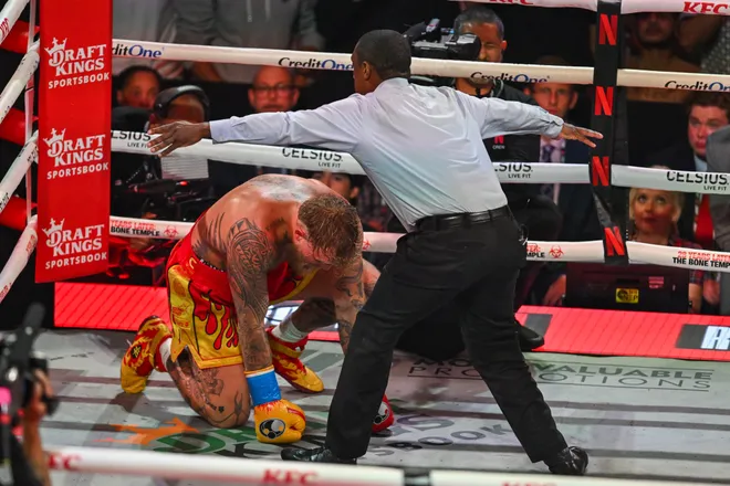 US boxer and influencer Jake Paul fights British boxer Anthony Joshua (off frame) in a non-title heavyweight bout at the Kaseya Center in Miami, Florida on December 19, 2025. (Photo by Giorgio VIERA / AFP via Getty Images)