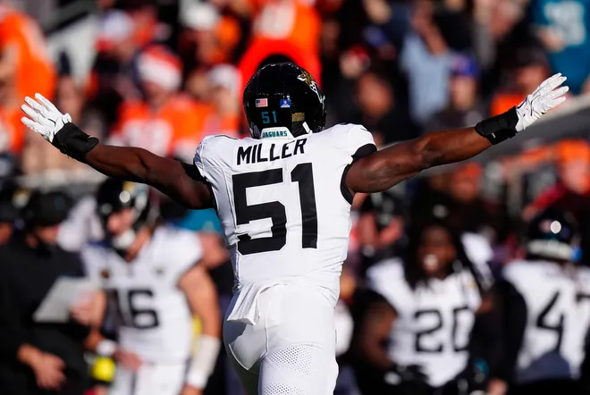 Dec 21, 2025; Denver, Colorado, USA; Jacksonville Jaguars linebacker Ventrell Miller (51) reacts during the first half at Empower Field at Mile High. Mandatory Credit: Ron Chenoy-Imagn Images