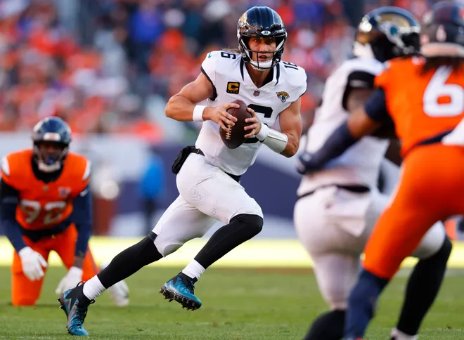 DENVER, COLORADO - DECEMBER 21: Trevor Lawrence #16 of the Jacksonville Jaguars looks to pass during the first quarter against the Denver Broncos at Empower Field At Mile High on December 21, 2025 in Denver, Colorado. (Photo by Justin Edmonds/Getty Images)