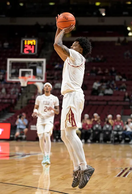 Dec 22, 2025; Tallahassee, Florida, USA; Florida State Seminoles guard Martin Somerville (1) makes a three point shot during the first half against the Jacksonville University Dolphins at Donald L. Tucker Center. Mandatory Credit: Melina Myers-Imagn Images