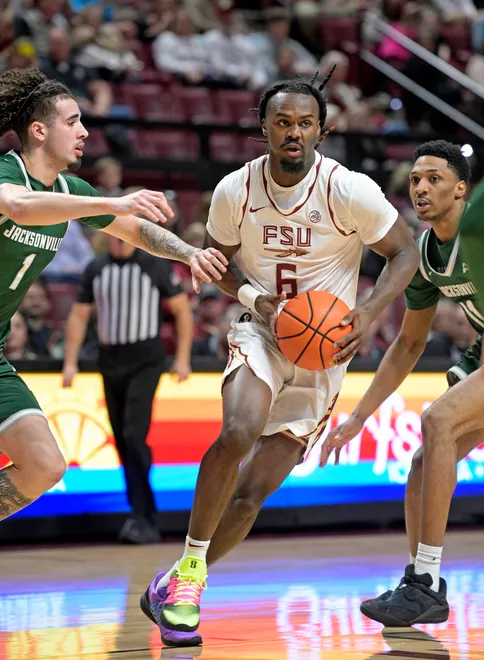 Dec 22, 2025; Tallahassee, Florida, USA; Florida State Seminoles guard Robert McCray (6) drives to the net during the first half against the Jacksonville University Dolphins at Donald L. Tucker Center. Mandatory Credit: Melina Myers-Imagn Images