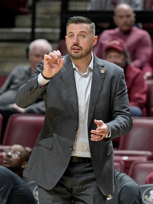 Dec 22, 2025; Tallahassee, Florida, USA; Florida State University head coach Luke Loucks during the first half against the Jacksonville University Dolphins at Donald L. Tucker Center. Mandatory Credit: Melina Myers-Imagn Images