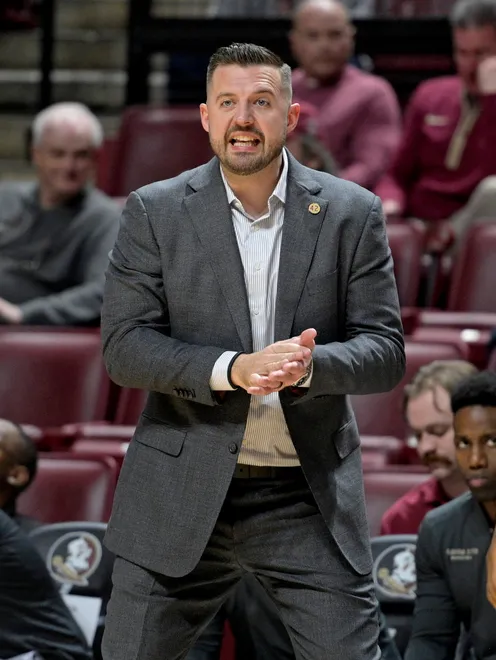Dec 22, 2025; Tallahassee, Florida, USA; Florida State University head coach Luke Loucks during the first half against the Jacksonville University Dolphins at Donald L. Tucker Center. Mandatory Credit: Melina Myers-Imagn Images