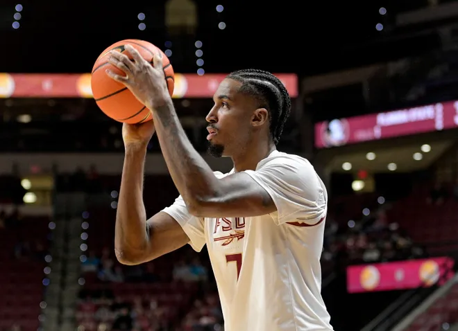 Dec 22, 2025; Tallahassee, Florida, USA; Florida State Seminoles forward Chauncey Wiggins (7) shoots the ball during the first half against the Jacksonville University Dolphins at Donald L. Tucker Center. Mandatory Credit: Melina Myers-Imagn Images