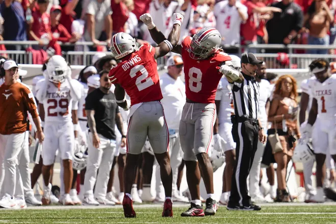 Ohio State Buckeyes safety Caleb Downs (2) and linebacker Arvell Reese (8) celebrate during the NCAA football game against the Texas Longhorns at Ohio Stadium on Aug. 30, 2025.