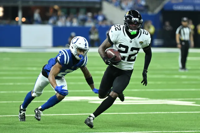 Dec 28, 2025; Indianapolis, Indiana, USA; Jacksonville Jaguars cornerback Jarrian Jones (22) runs against Indianapolis Colts wide receiver Josh Downs (2) during the second half at Lucas Oil Stadium. Mandatory Credit: Robert Goddin-Imagn Images