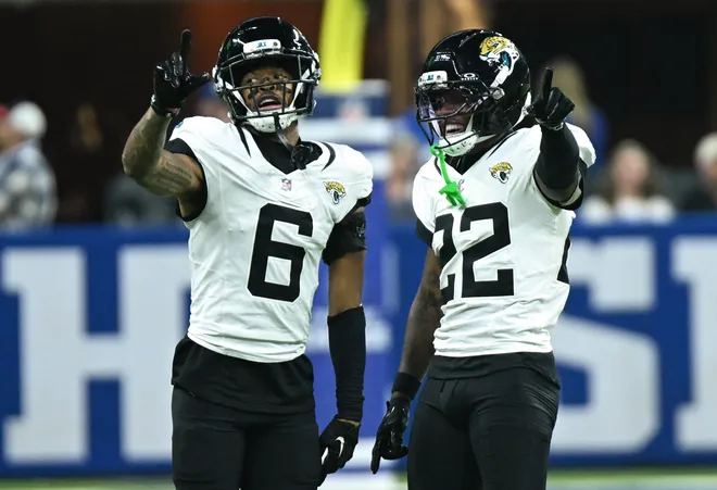 Dec 28, 2025; Indianapolis, Indiana, USA; Jacksonville Jaguars cornerback Greg Newsome II (6) and cornerback Jarrian Jones (22) react after a play during the second half against the Indianapolis Colts at Lucas Oil Stadium. Mandatory Credit: Robert Goddin-Imagn Images