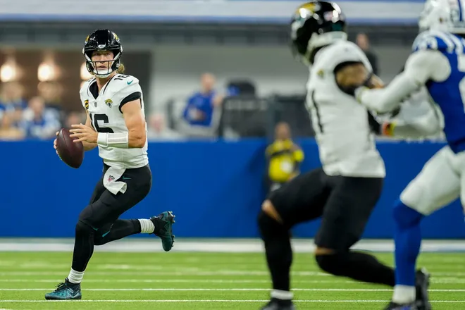 Jacksonville Jaguars quarterback Trevor Lawrence (16) looks to pass downfield Sunday, Dec. 28, 2025, during a game against the Indianapolis Colts at Lucas Oil Stadium in Indianapolis.