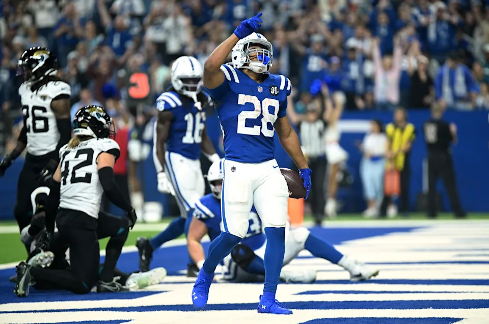 Dec 28, 2025; Indianapolis, Indiana, USA; Indianapolis Colts running back Jonathan Taylor (28) reacts after a touchdown during the first half against the Jacksonville Jaguars at Lucas Oil Stadium. Mandatory Credit: Robert Goddin-Imagn Images