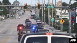 A motorcade with US President Donald Trump travels in Palm Beach on December 20.