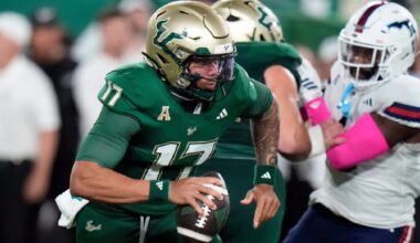 USF quarterback Byrum Brown scrambles for yardage during the Bulls' win against FAU Oct. 18 in Tampa. (AP Photo/Chris O'Meara)