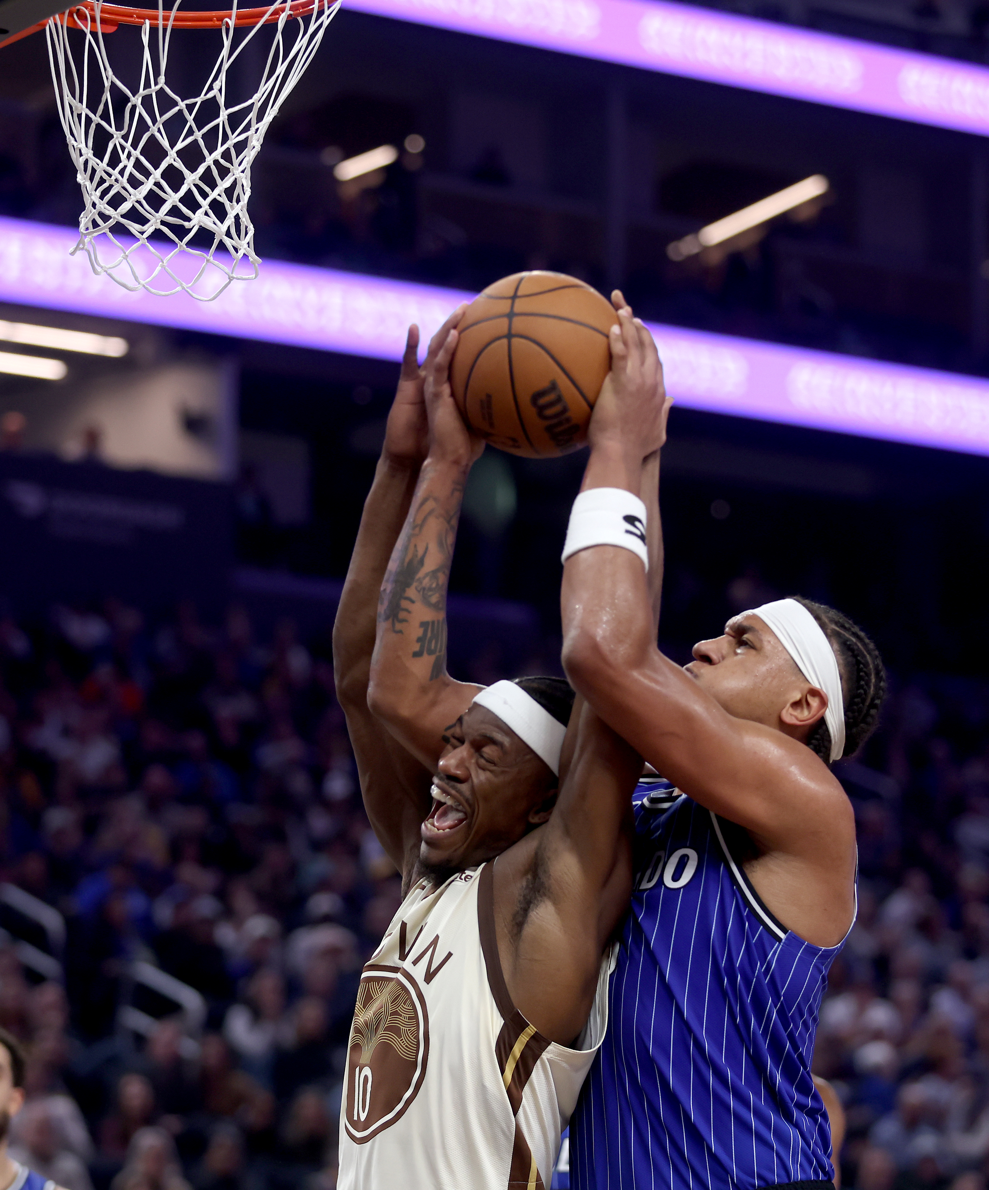 Golden State Warriors’ Jimmy Butler III #10 and Orlando Magic’s...