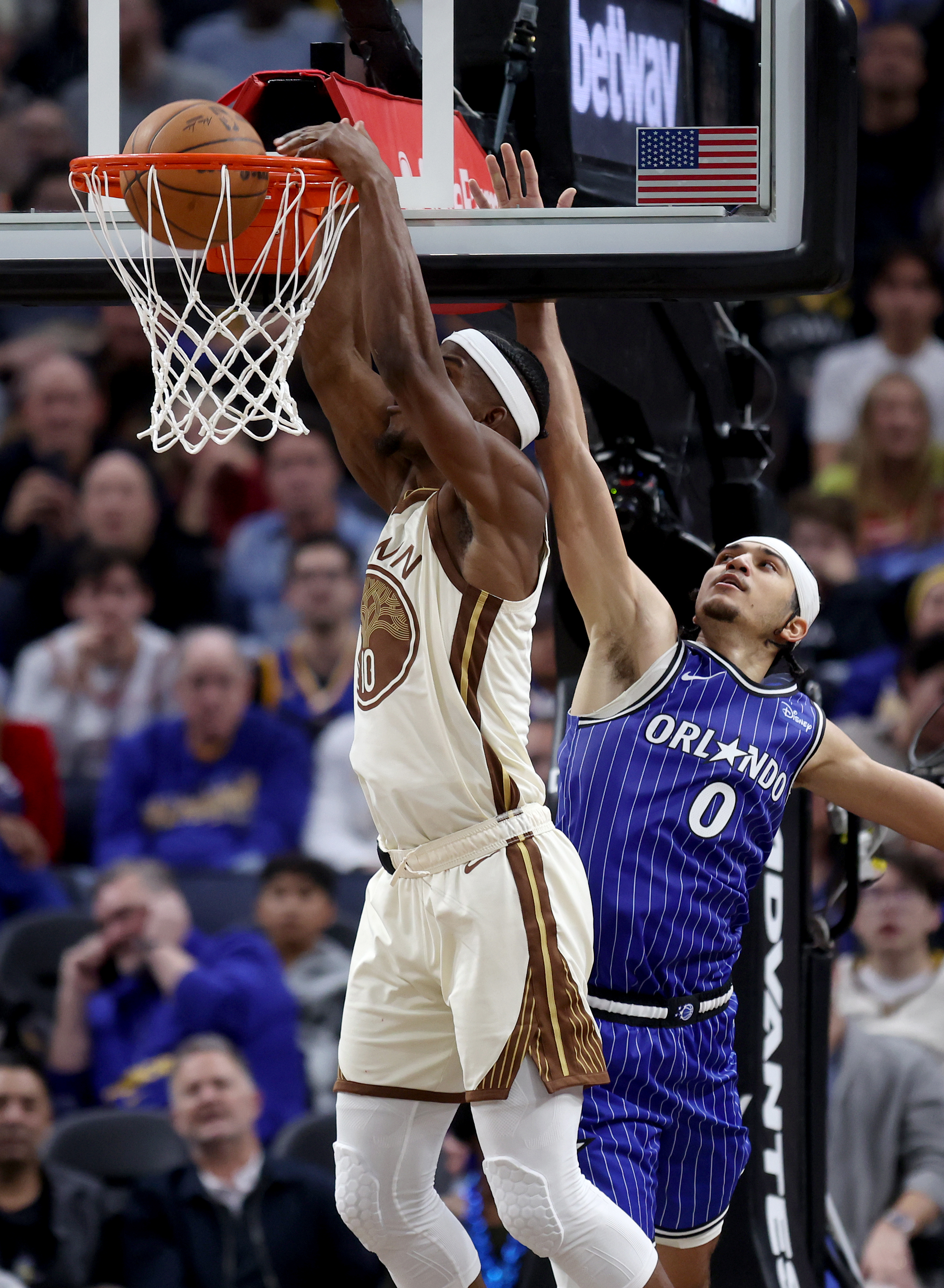 Golden State Warriors’ Jimmy Butler III #10 dunks past Orlando...