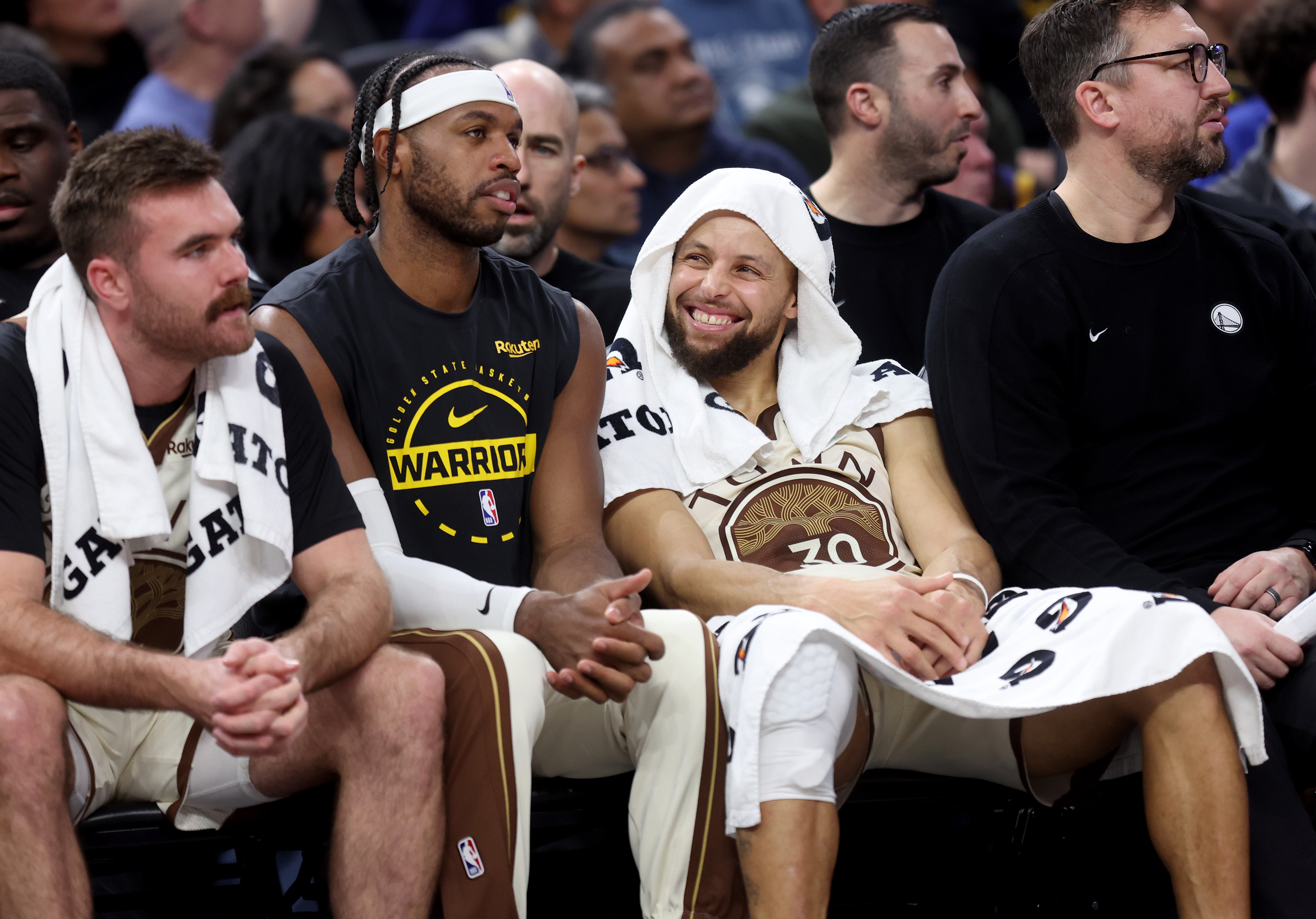 Golden State Warriors’ Stephen Curry #30 on the bench in...