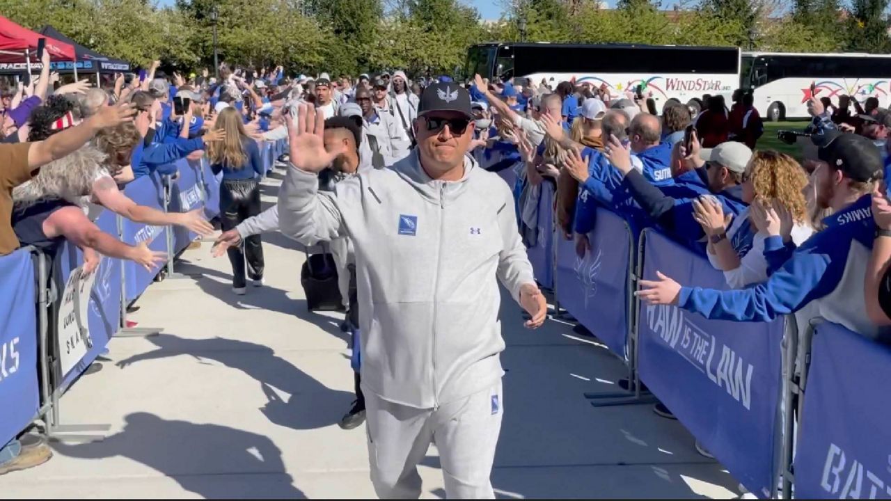 St. Louis Battlehawks Head Coach Anthony Becht is greeted by fans as the team arrived prior to a football game at The Dome at America's Center. (Spectrum News/Gregg Palermo)