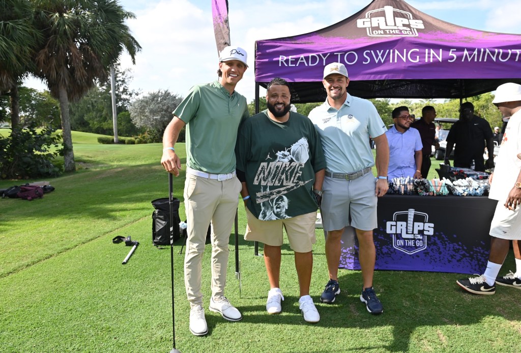 A group of men at a gold course
