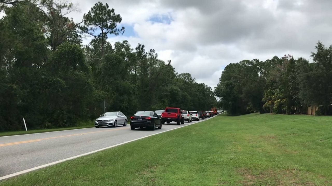 With just two lanes for traffic, backups are common on Ficquette Road. (Spectrum News/Jesse Walden)