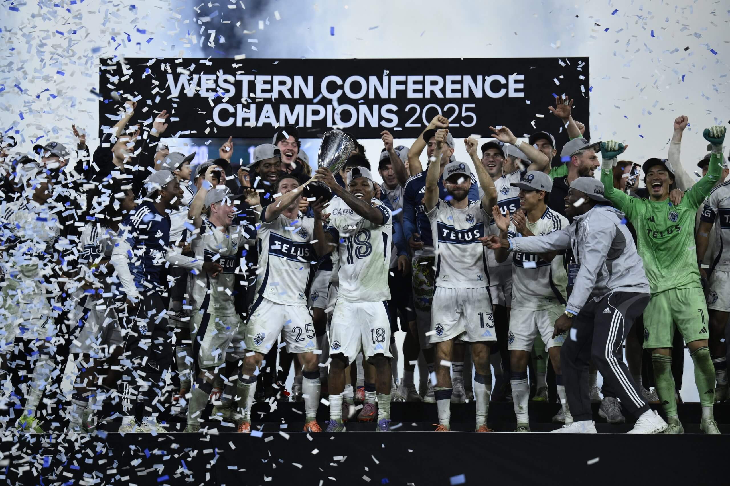 The Vancouver Whitecaps lift the Western Conference title trophy