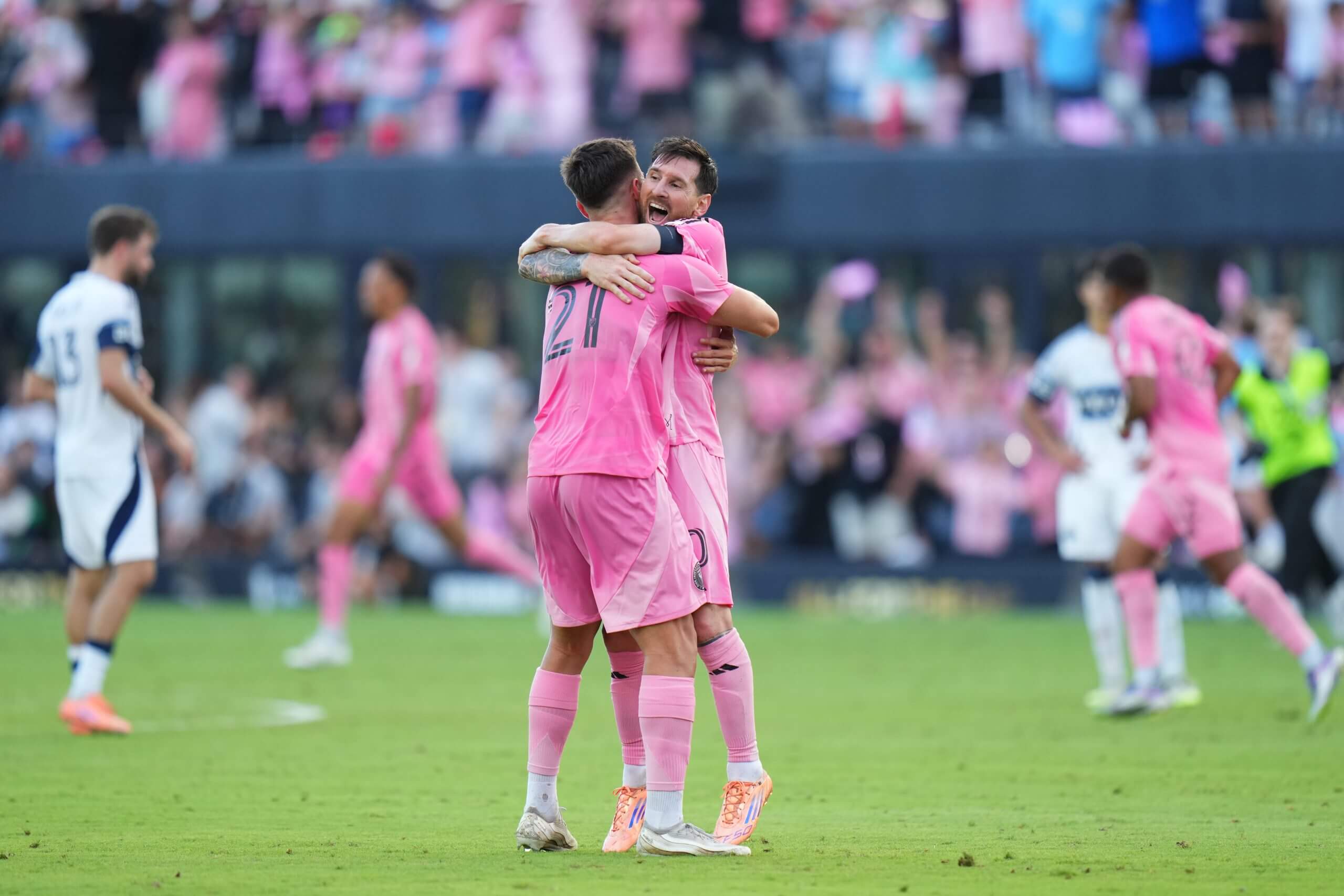 Tadeo Allende and Lionel Messi celebrate during MLS Cup