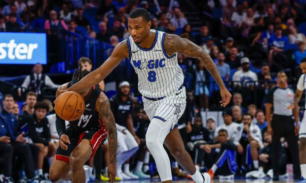 Orlando Magic forward Jamal Cain (8) gets the ball on a fast break against the Miami Heat during the second half of a preseason NBA basketball game, Sunday, Oct. 12, 2025, in Orlando, Fla. (AP Photo/Kevin Kolczynski)
