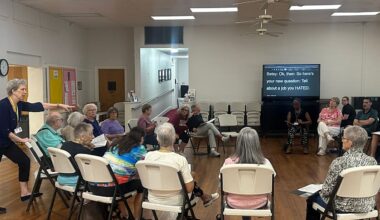 Christine Hicks leads "Narrators" group in weekly rehearsal, held in church off Winter Park's Park Avenue. Group is preparing for its upcoming holiday show. (Spectrum News 13/Julie Gargotta)