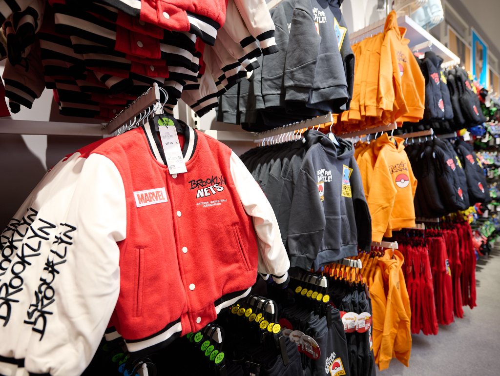 photo of jackets on the racks inside a clothing store
