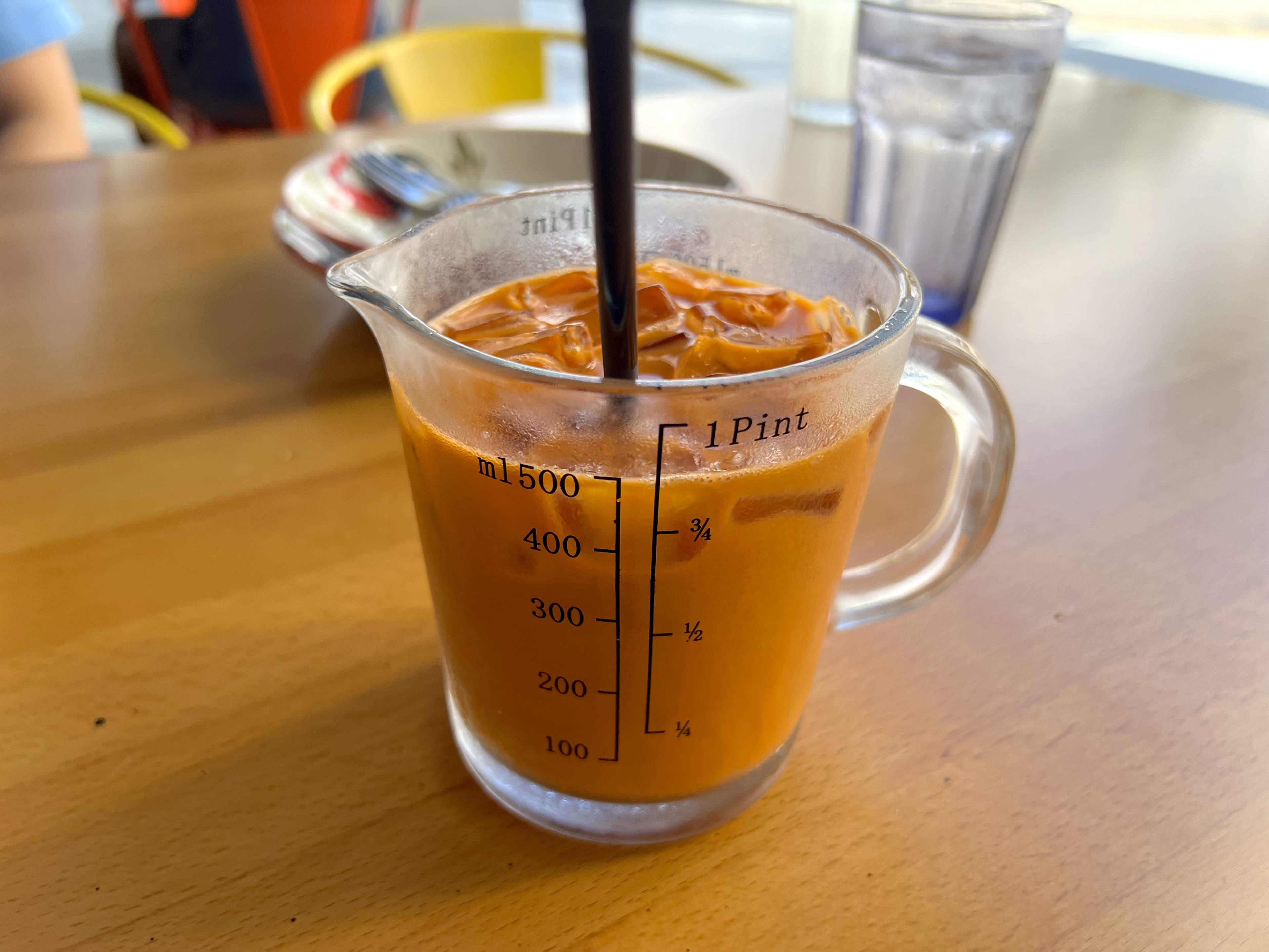 A pint cup of Thai tea.