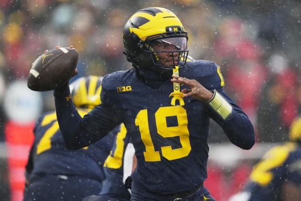 Michigan quarterback Bryce Underwood throws during the first half of an NCAA college football game against Ohio State, Saturday, Nov. 29. The Wolverines are making their seventh appearance in the Citrus Bowl. (AP Photo/Ryan Sun)