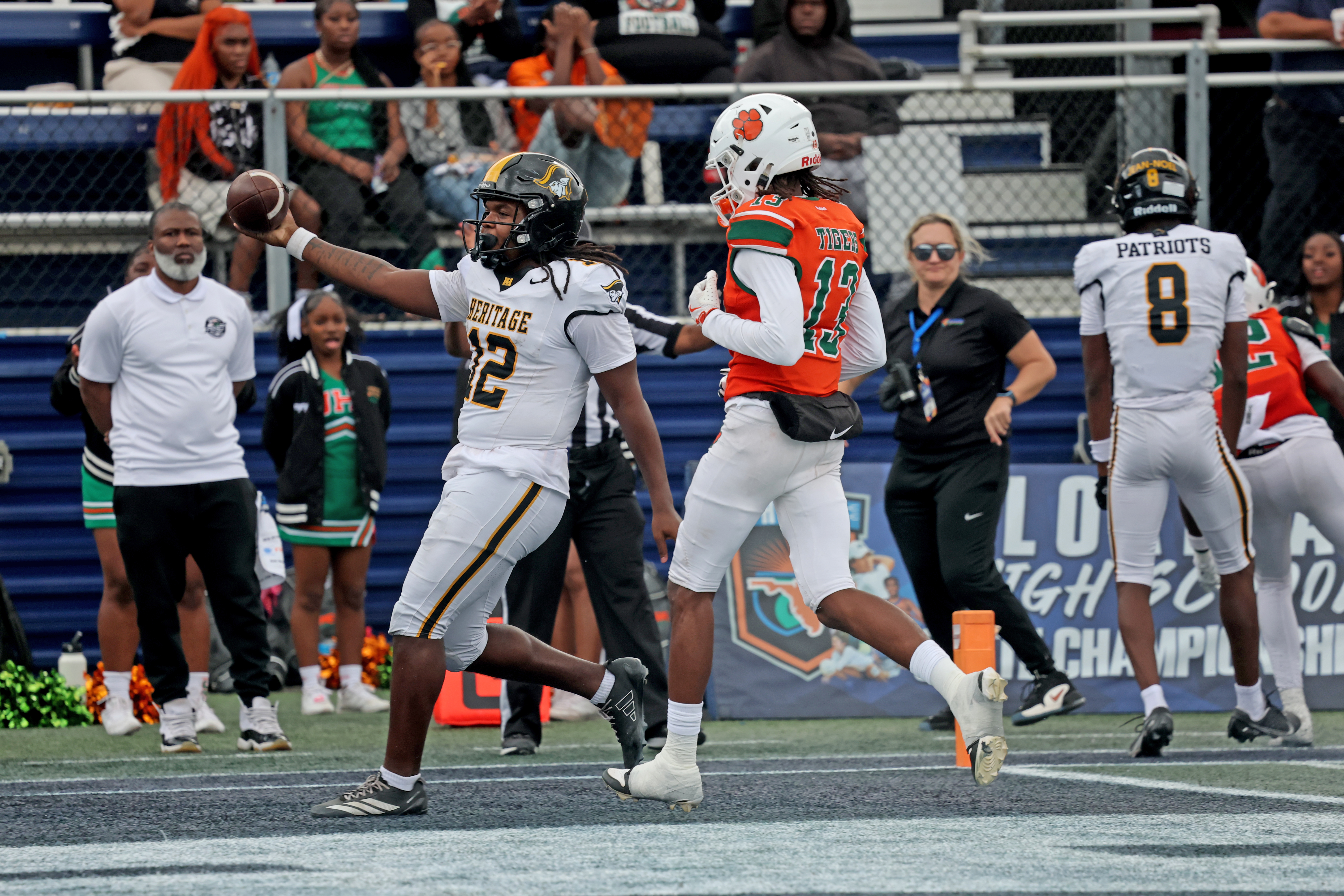 American Heritage High Schoolâs Leon Strawder scores a touchdown against...