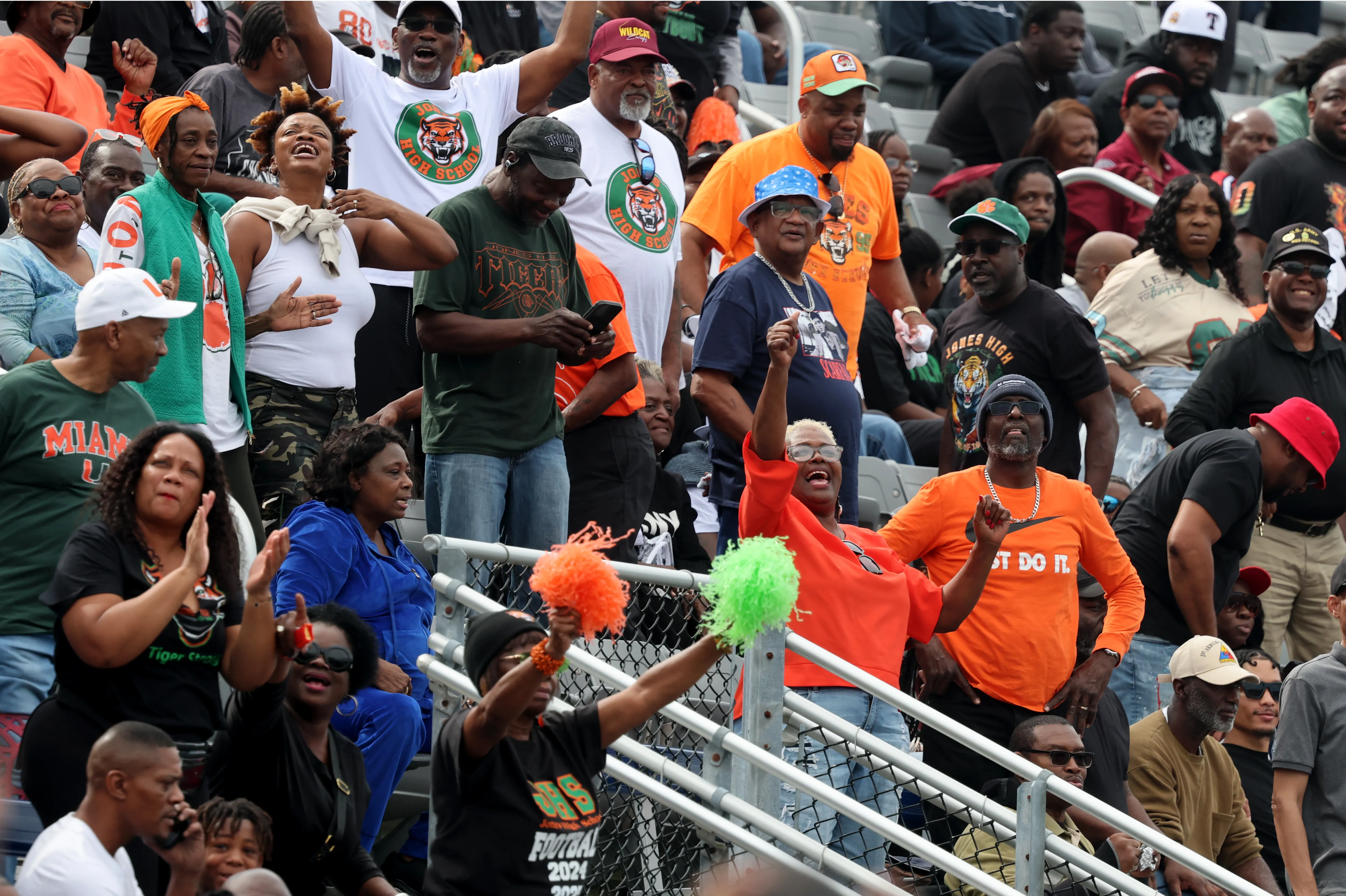 Jones High Schoolâ fans cheer on the team against American...