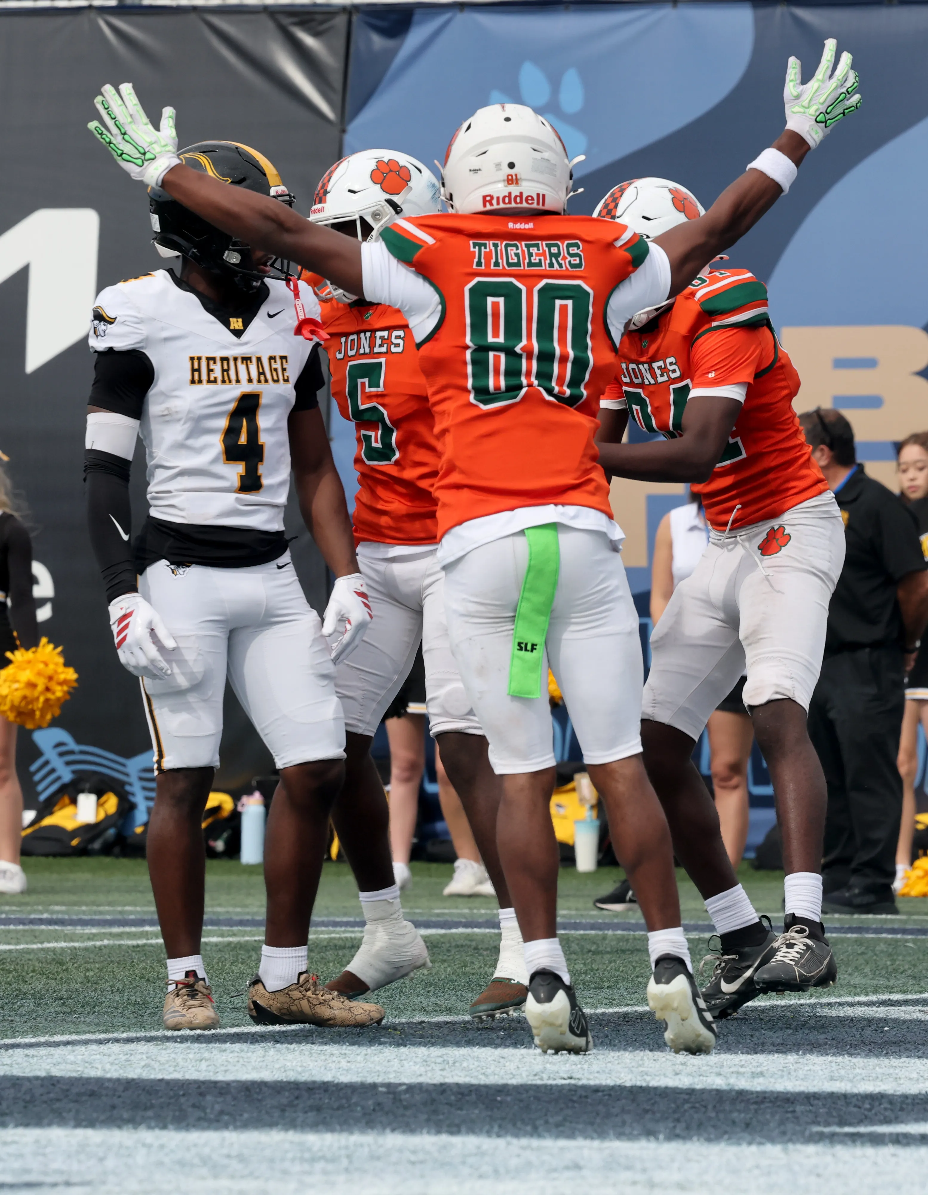 Jones High Schoolâs Daionte Hicks scored the first touchdown of...