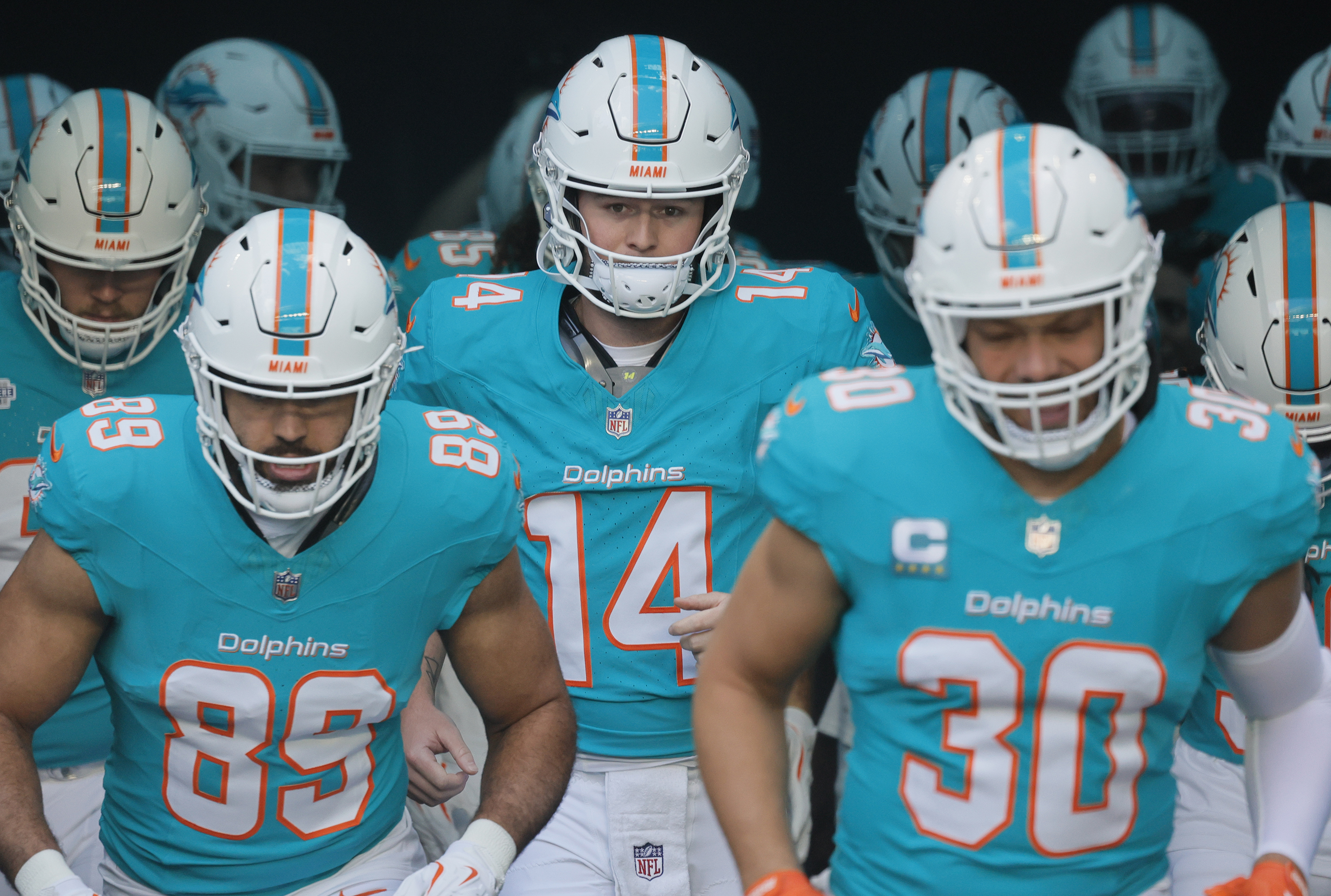 Miami Dolphins quarterback Quinn Ewers (14) takes the field before...