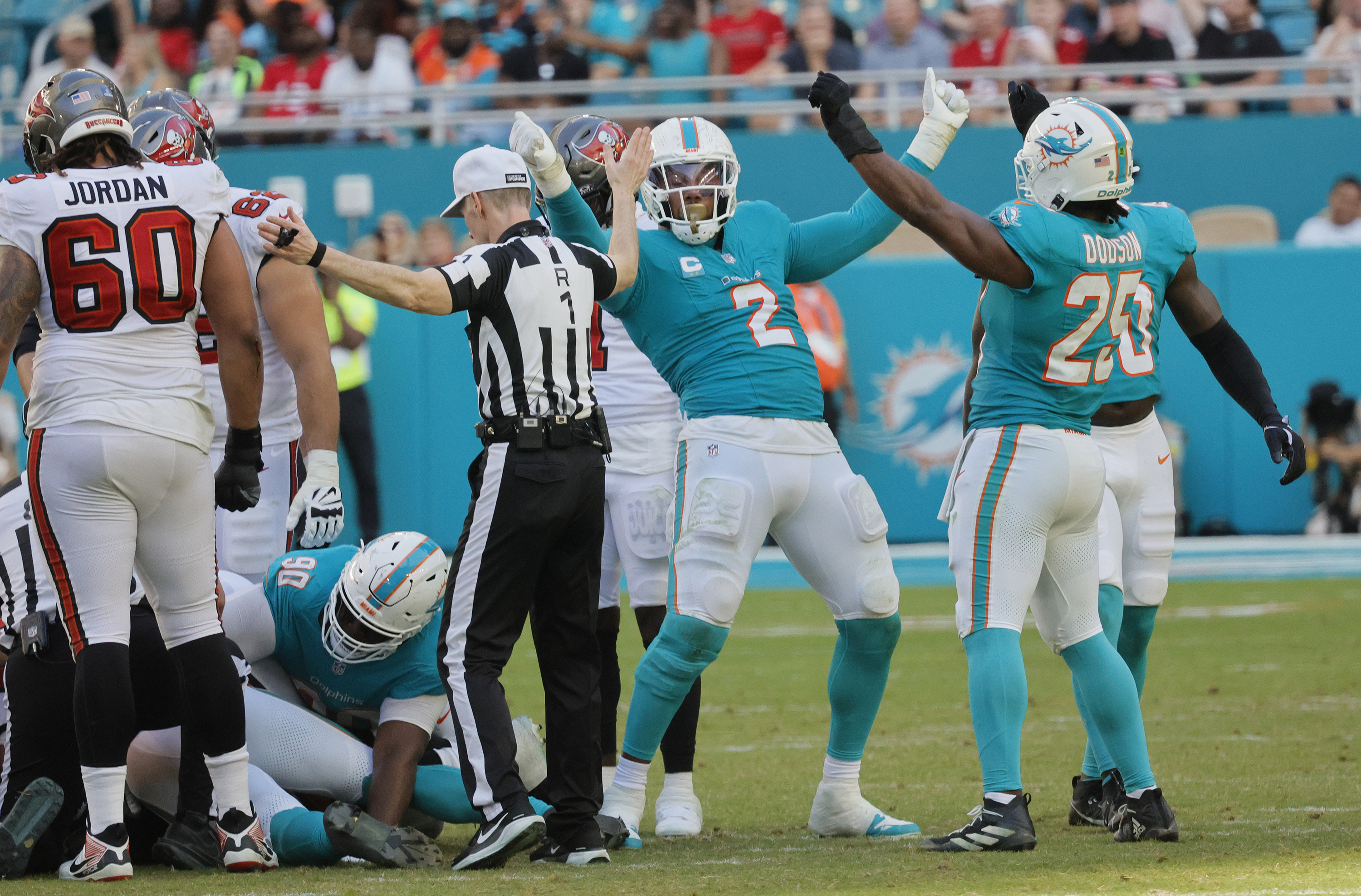 Miami Dolphins linebacker Bradley Chubb (2) celebrates a fumble recovery...