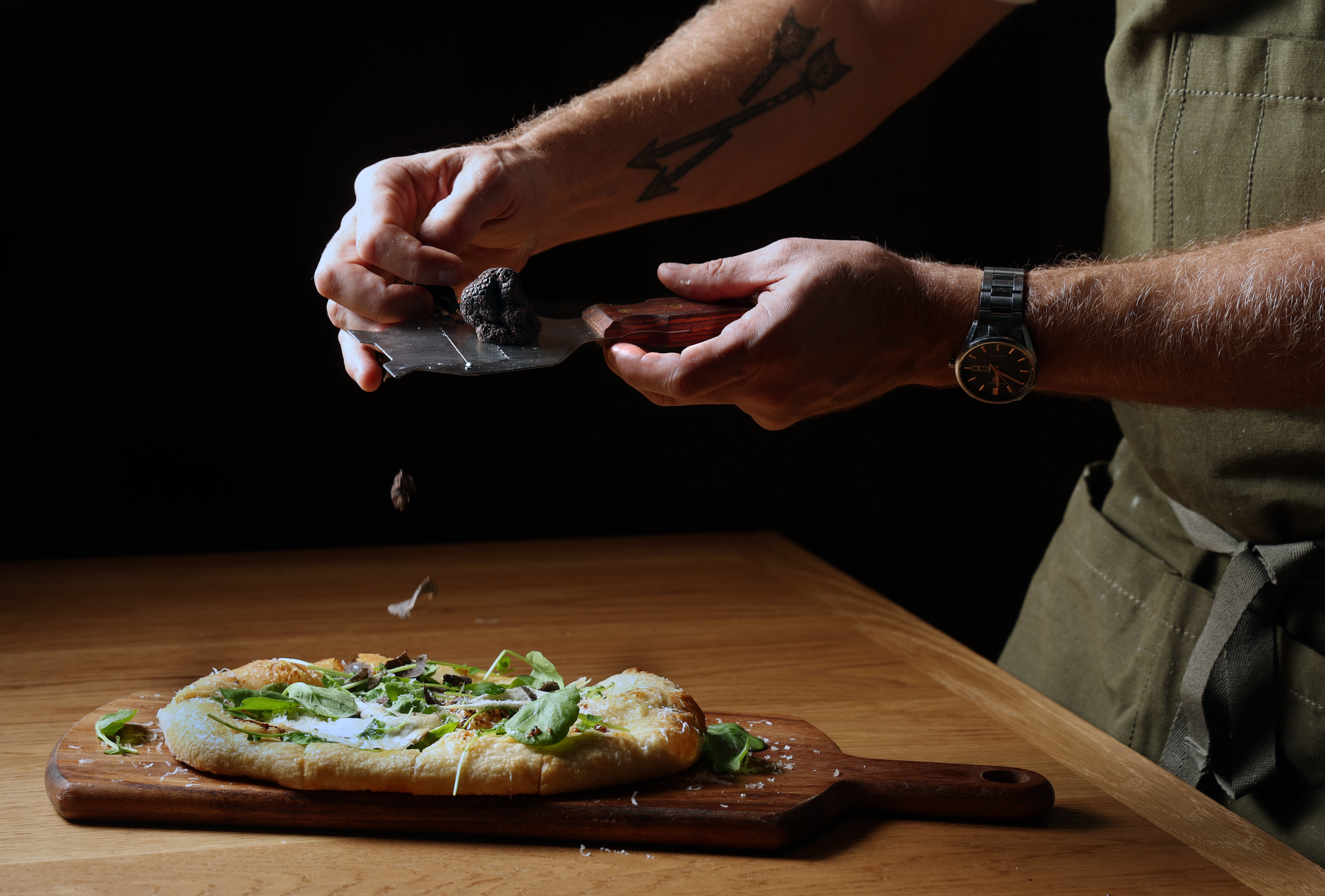 Sourdough flatbread with black truffle, caramelized onion, fontal cheese,aged balsamic...