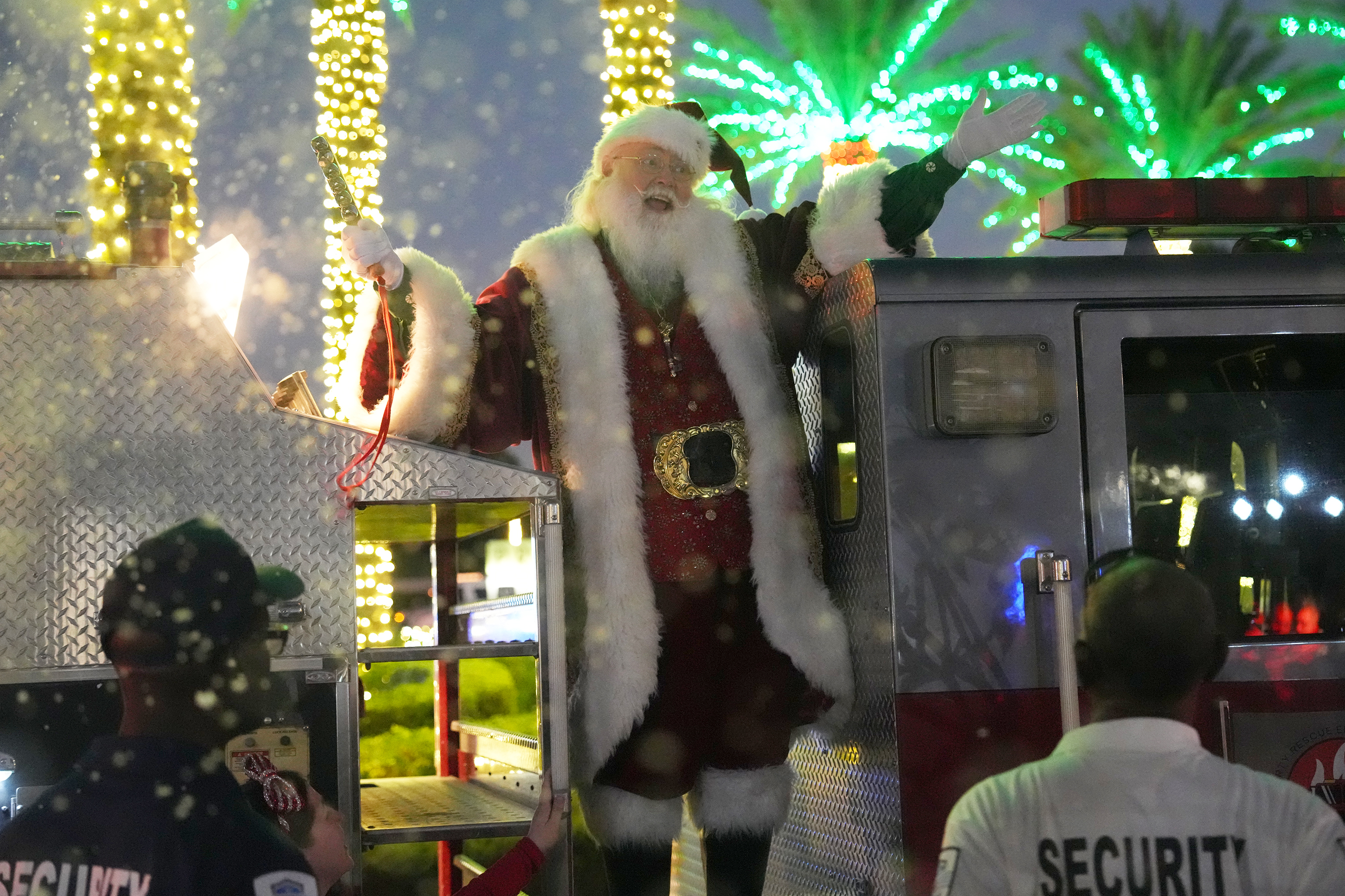 Richard Adler of West Palm Beach plays Santa during a...