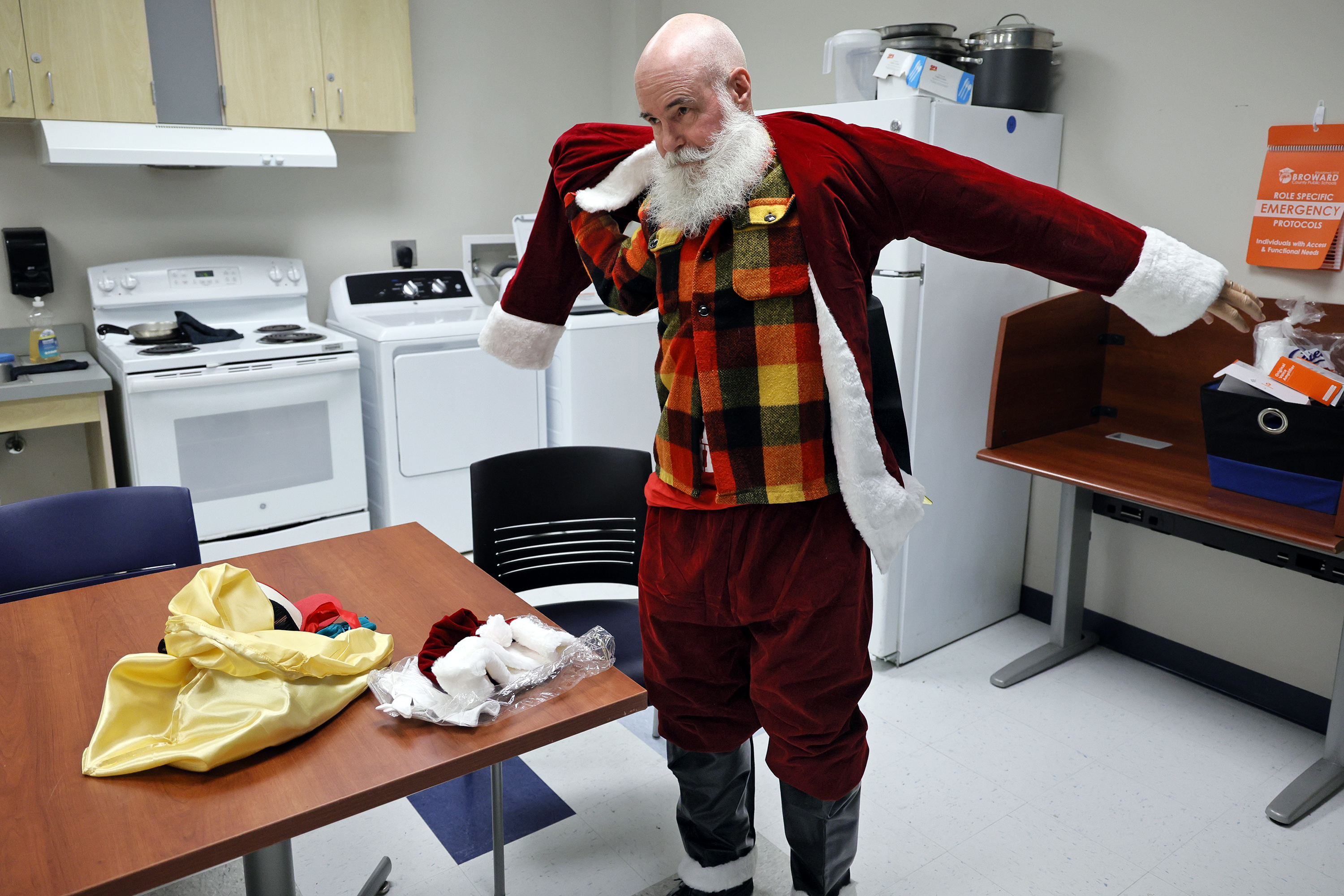 Sun Sentinel staff writer Ben Crandell dresses the part before...