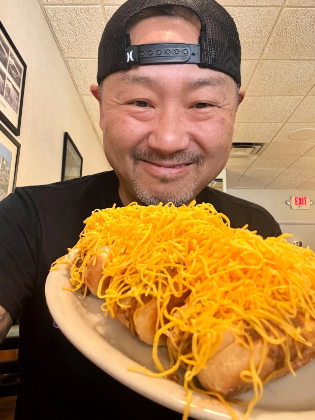Chef Takeshi Kamioka, who operates popular Fort Lauderdale food truck Kaminari Ramen, with his Coneys at Skyline Chili in Sunrise. (Takeshi Kamioka/Courtesy)