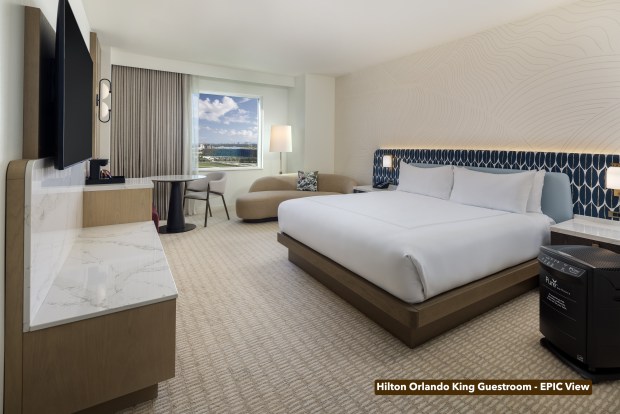 Each of the Hilton Orlando's 1,425 rooms has been renovated with the serene color palette and furnishings selected by Looney & Associates. Select rooms will be equipped with an air purification system to accommodate guests with asthma or other respiratory issues. (Courtesy of RIDA Development)