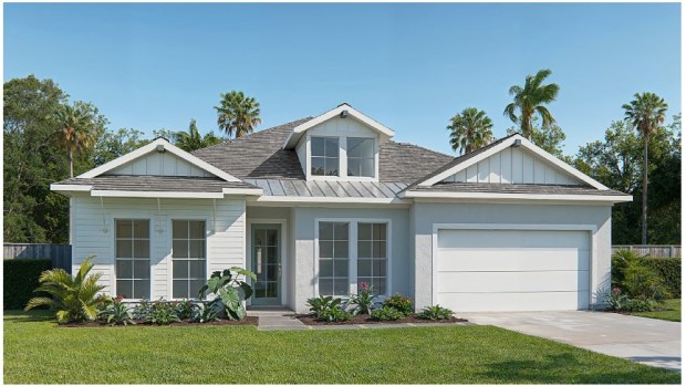 The farmhouse elevation of this four-bedroom home uses siding, gables and a dormer on the exterior. This plan has 2,957 square feet of living space and three-car garage. (Courtesy of Perry Homes)