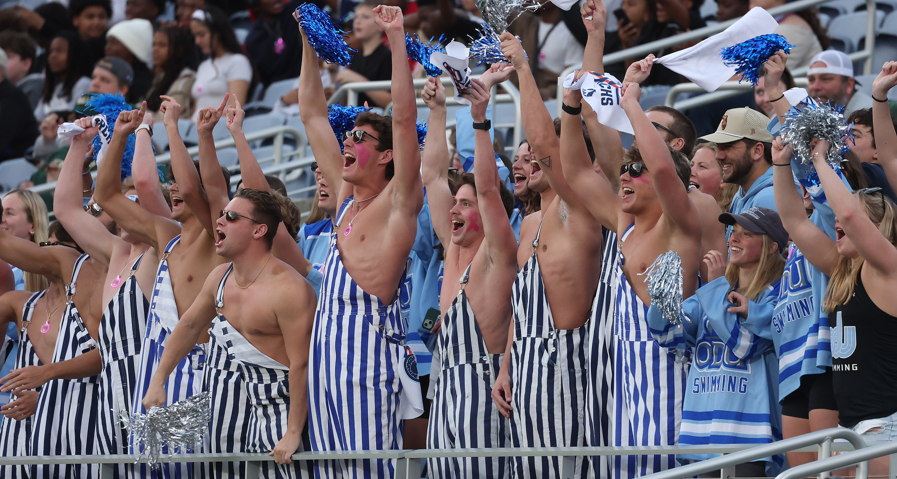 Old Dominion fans cheer during the Cure Bowl game of...
