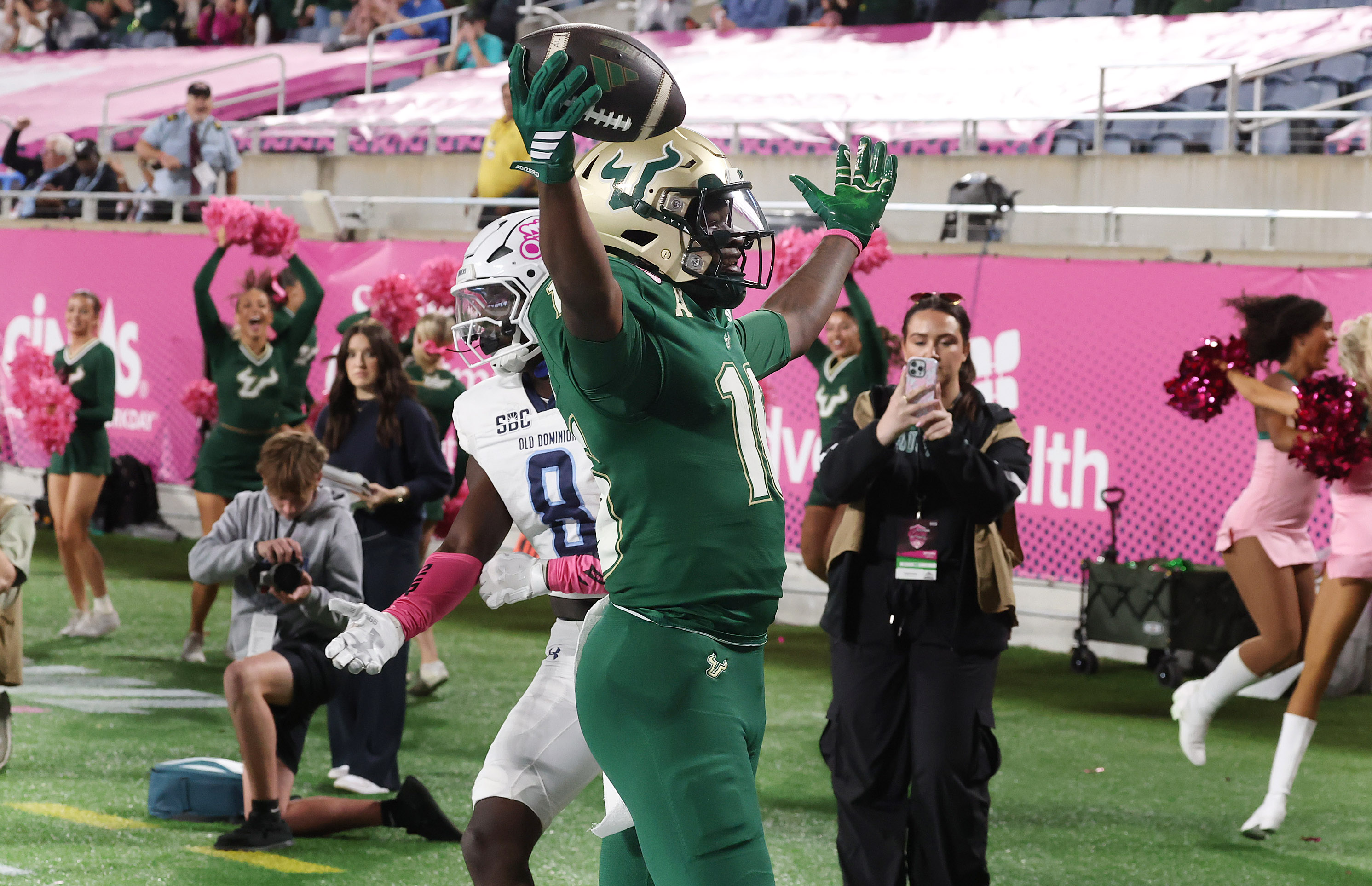 USF wide receiver Jeremiah Koger celebrates after scoring a touchdown...