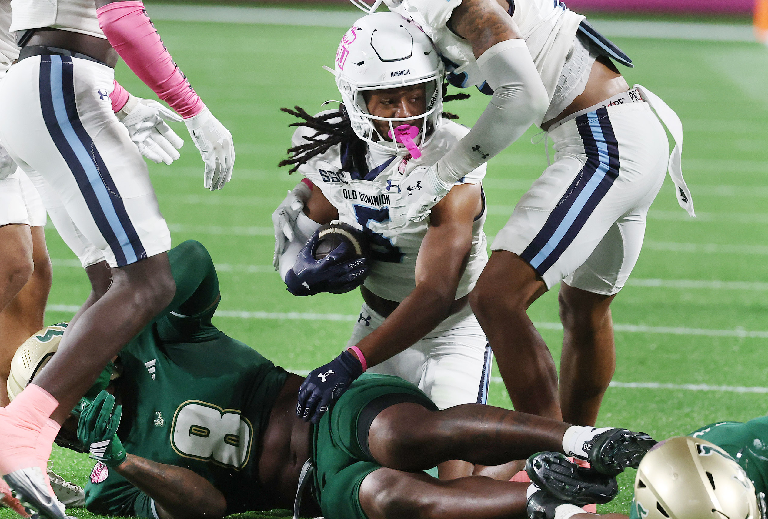 Old Dominion cornerback Brandon Crutchfield (5) recovers a fumble during...