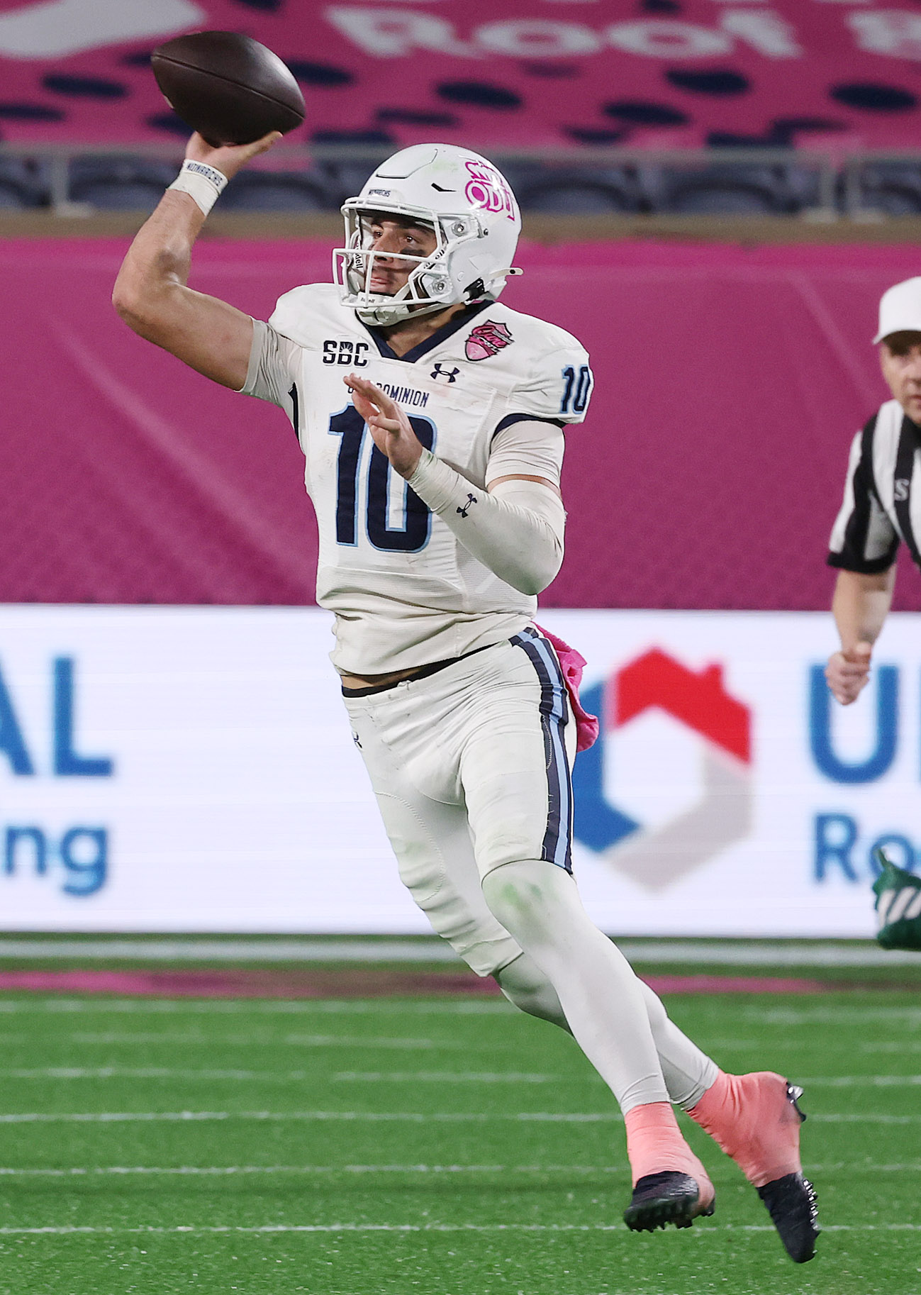 Old Dominion quarterback Quinn Henicle throws during the Cure Bowl...